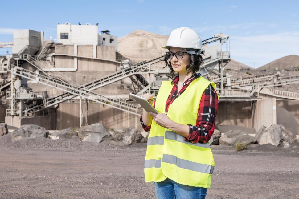 Free Image of Industrial architect working with tablet on construction site 