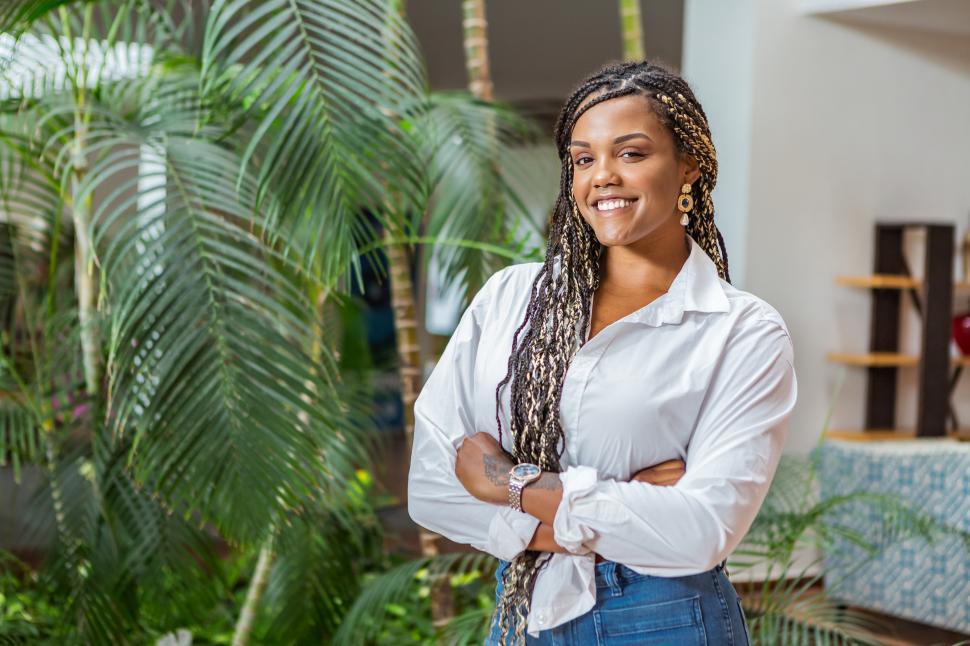 Free Image of Portrait of a smiling African American adult woman standing with 