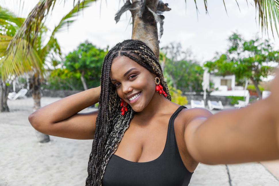 Free Image of Happy African American woman taking a selfie 