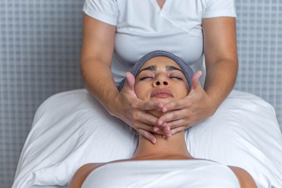 Free Image of Esthetician performing a facial massage 