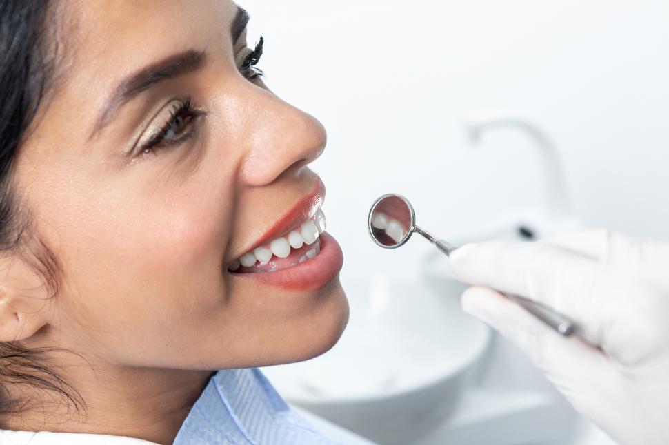 Free Image of Close up view of a face of a patient in a dental clinic 