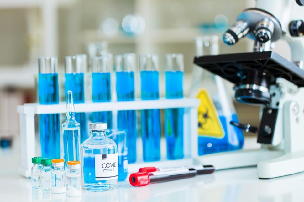 Free Image of Chemical test tubes and blood sample. 