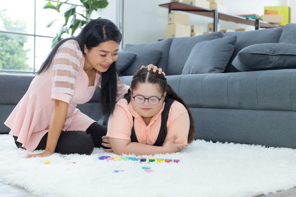 Free Image of Autistic girl practicing learning development at home. 