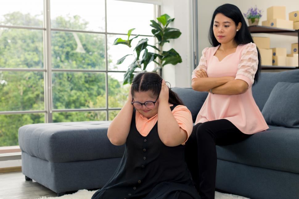 Free Image of Daughter blocking out mother 