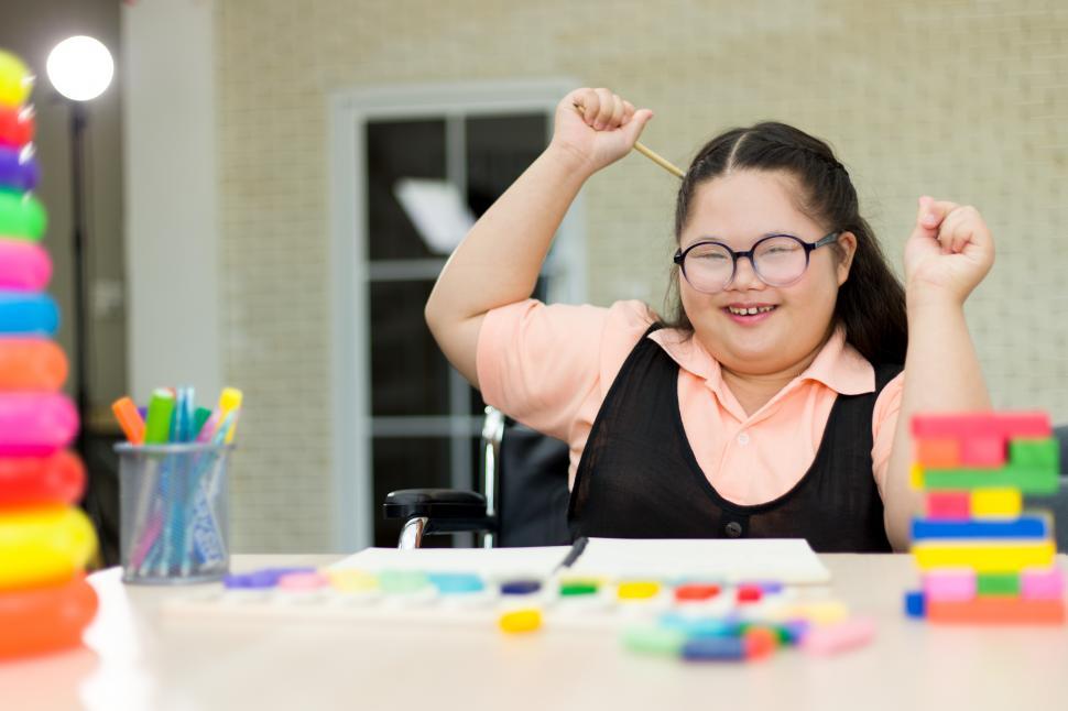 Free Image of Autistic girl practicing learning development at home 