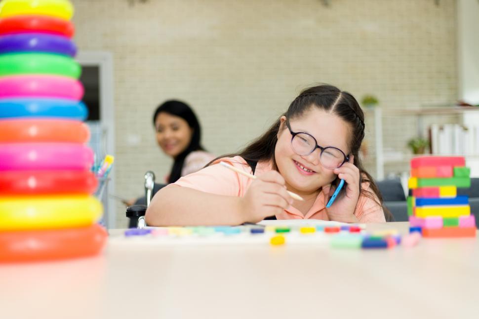 Free Image of Autistic girl learning at home 