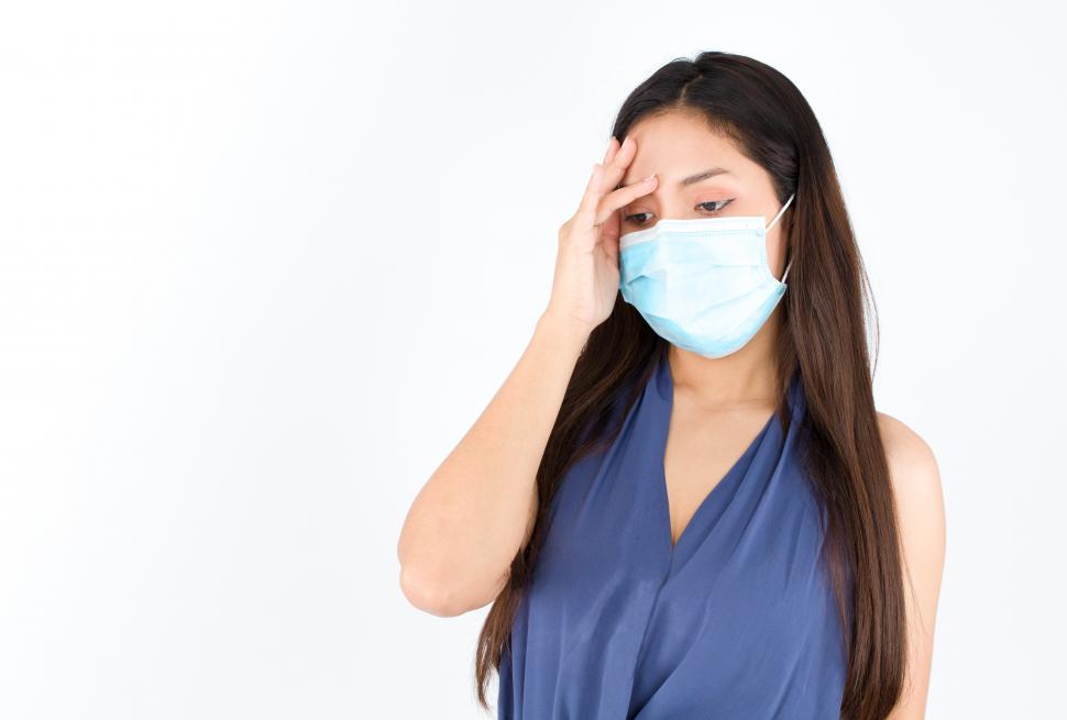 Free Image of Asian woman is starting to feel sick 