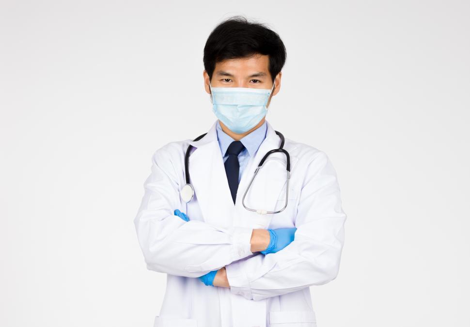 Free Image of Portrait of Doctor standing arms crossed 