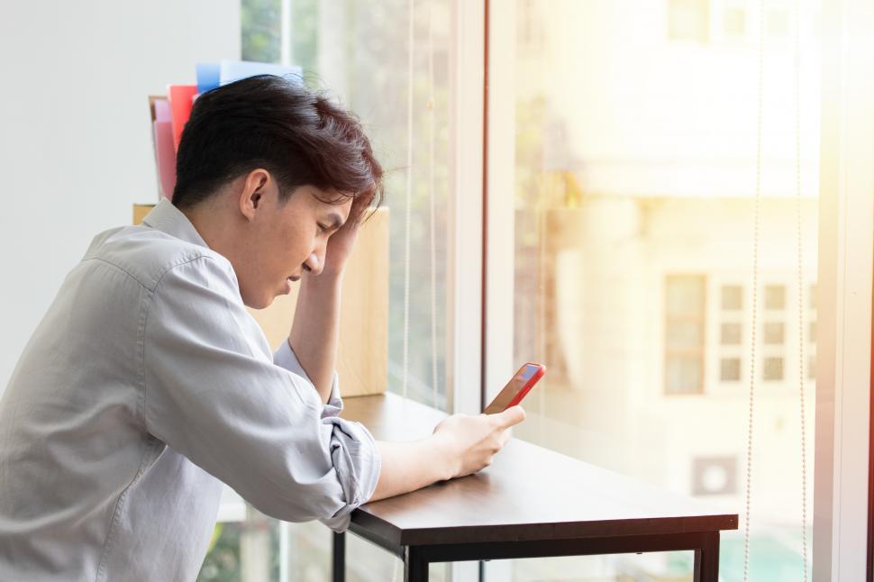 Free Image of Men feel stressed about their problems in life 