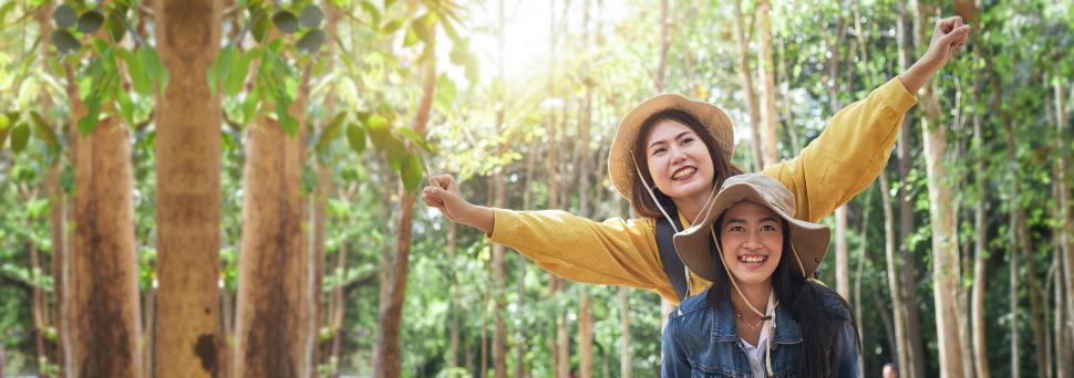 Free Image of Two female travelers enjoy touring in the wild 