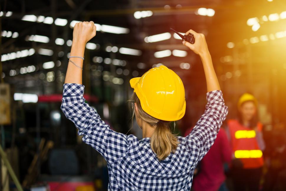 Free Image of Back of female workers in an industrial factory 