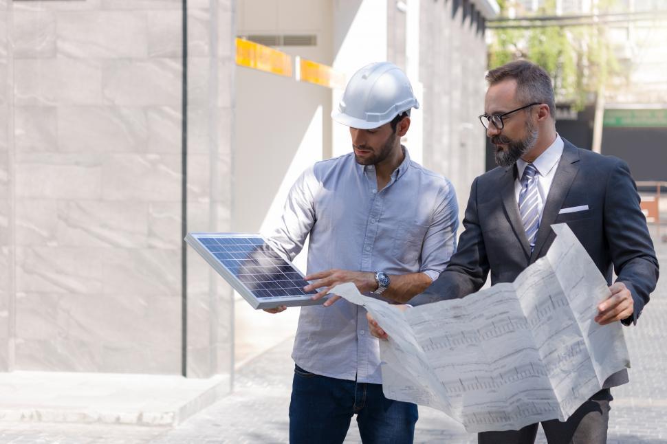 Free Image of Engineers inspecting solar panels before installation 