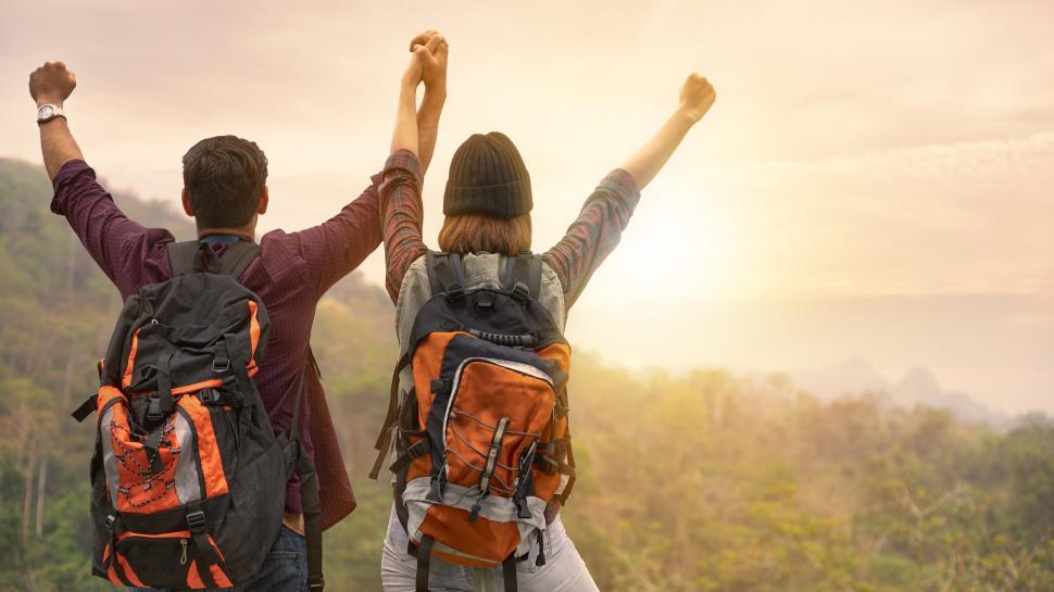 Free Image of A tourist couple watching the sunrise 