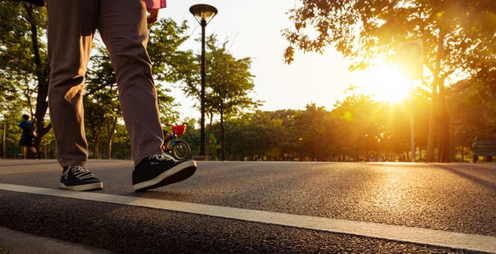 Free Image of People walking on the streets at sunset 