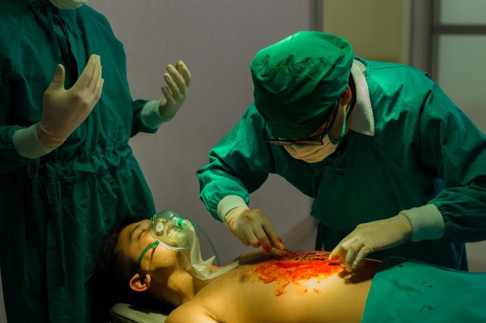 Free Image of Surgeons perform simulated surgery 