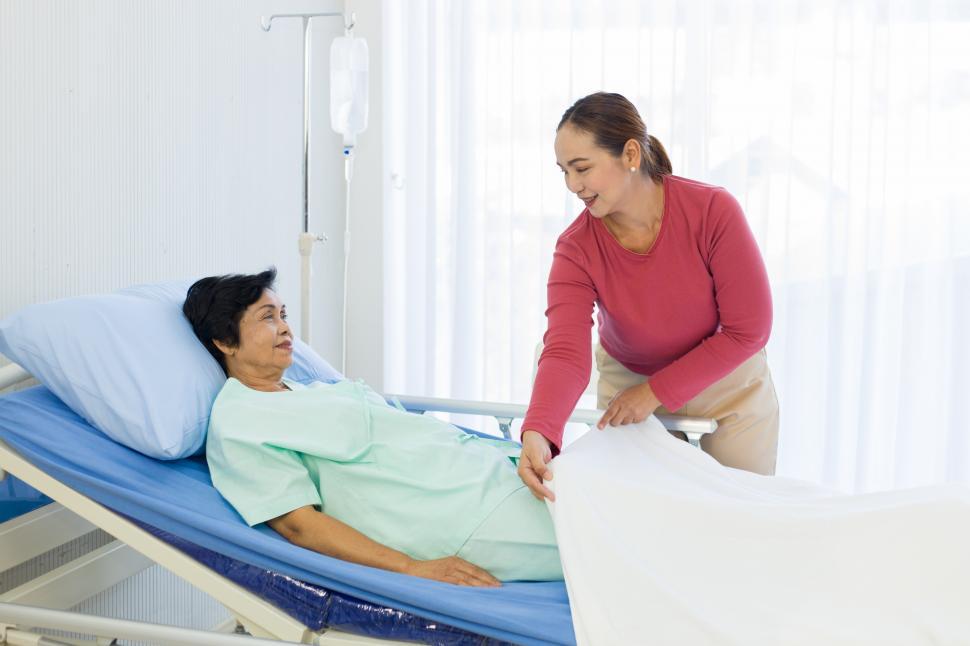 Free Image of Daughter came to visit the sick mother in the hospital 