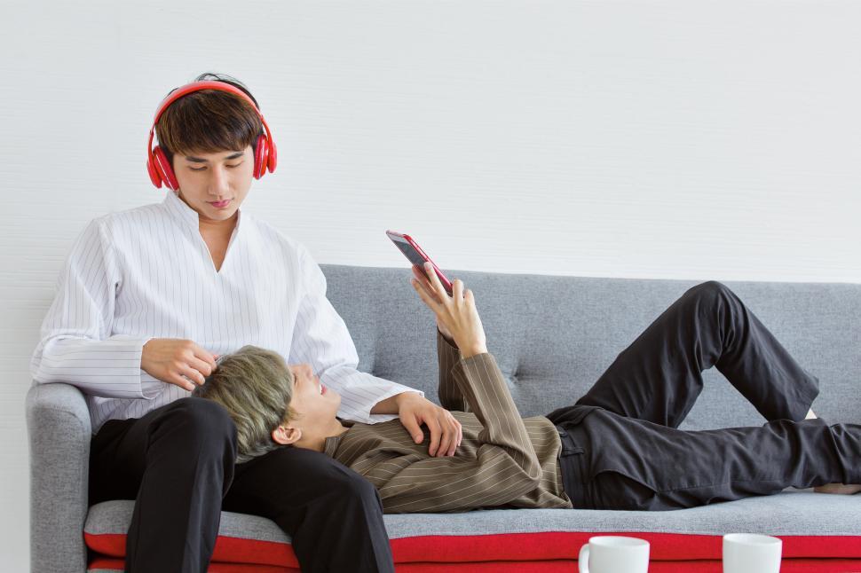 Free Image of Gay couple relaxing together 