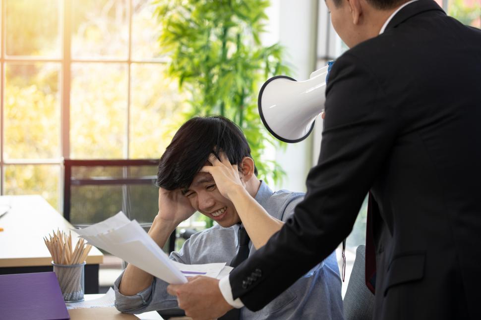 Free Image of Supervisor scolding his subordinate 