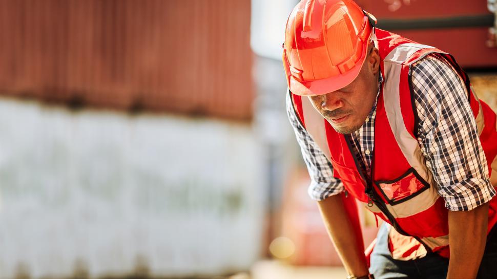 Free Image of Workers are weary of hard work the hot weather 