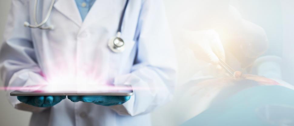 Free Image of Innovative medical concept in the diagnosis and treatment shines from tablet 