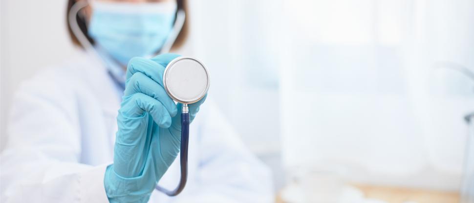 Free Image of A doctor with a stethoscope for examination - medical background 