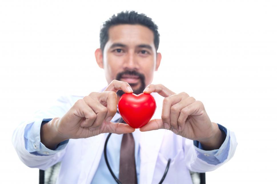 Free Image of Doctor wearing a doctor gown with a stethoscope 