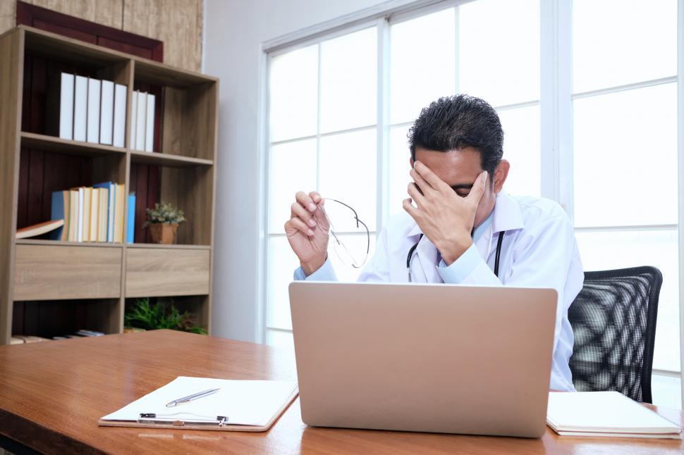 Free Image of Doctor is feeling stressed 