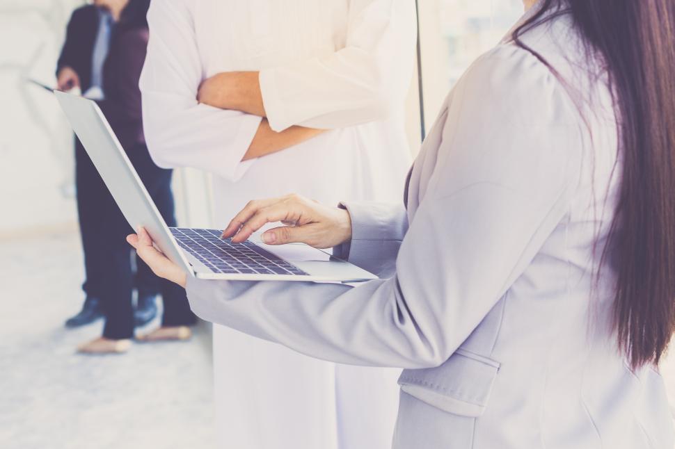 Free Image of Close-up - business woman presenting a plan 