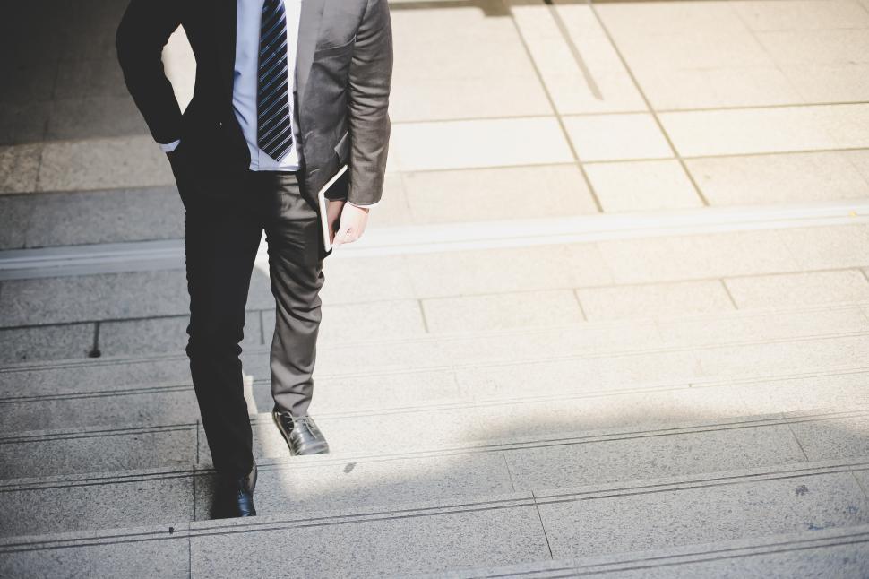 Free Image of Businessman are stepping up staircase 
