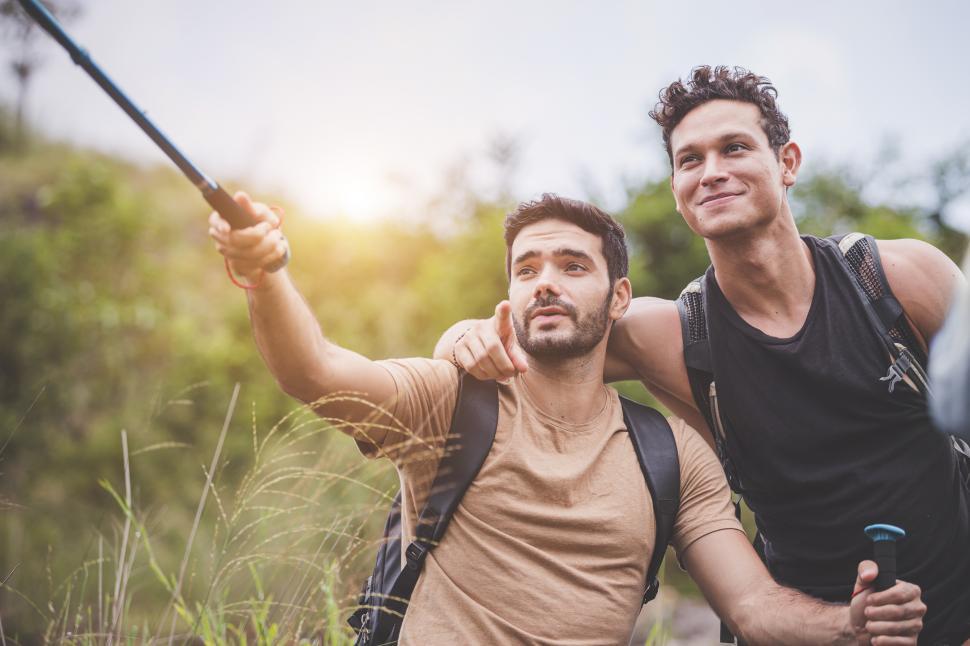 Free Image of Hikers with selfie stick 