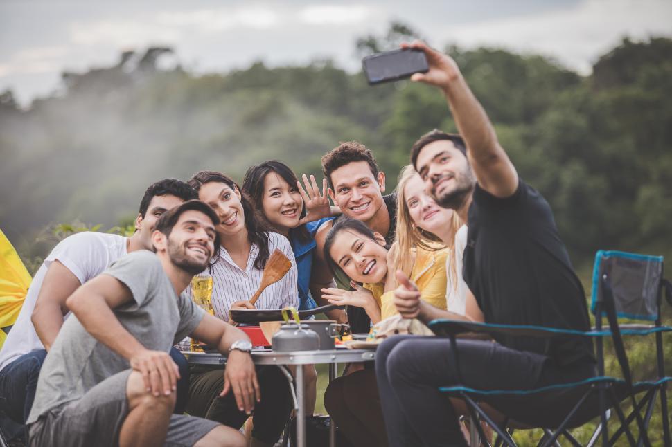 Free Image of Camping season. Group of campers take a selfie 