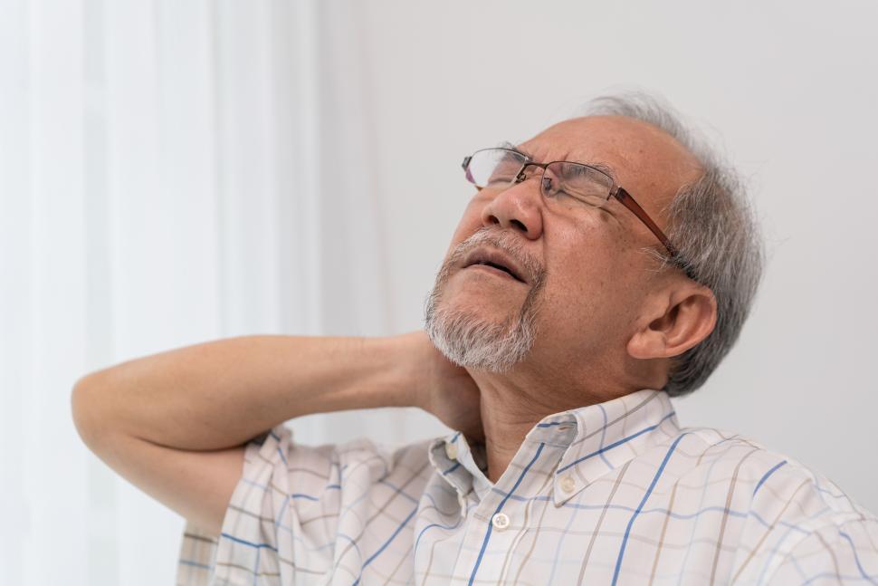 Free Image of Senior adult has neck pain 