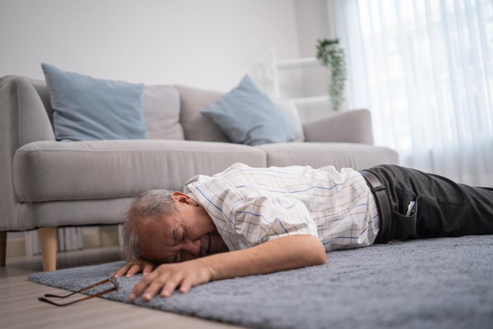 Free Image of Senior citizen fainting and falling on the ground 