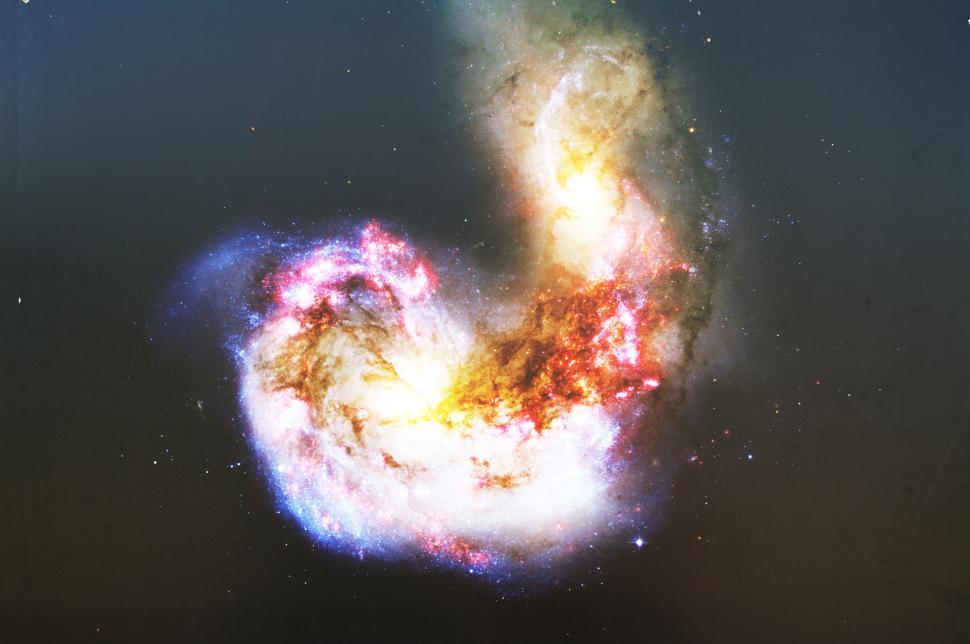 Free Image of Two Spiral Shaped Objects in the Sky 