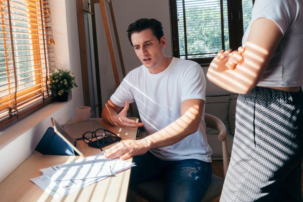Free Image of Stressed couple discussing finances 