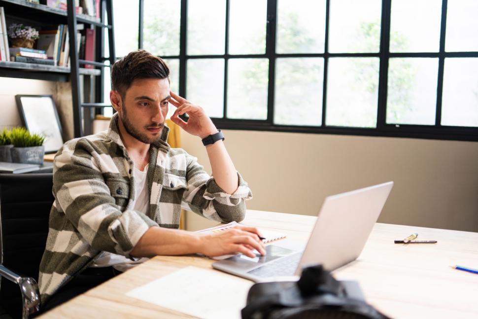 Free Image of Product designer working on laptop 