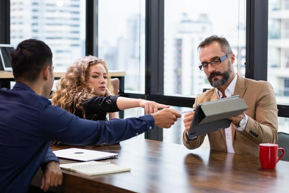 Free Image of Businessman presenting project on digital tablet 
