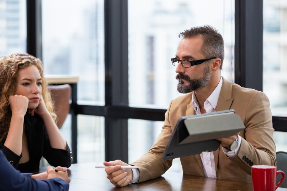 Free Image of Businessman presenting on digital tablet 
