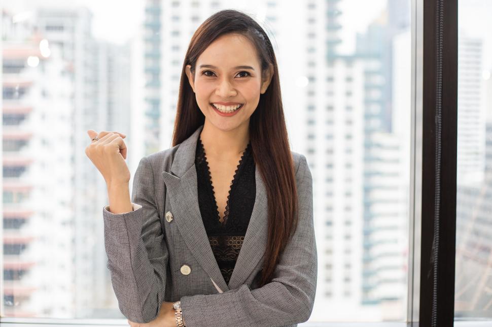 Free Image of Portrait of businesswoman smiling in the office 