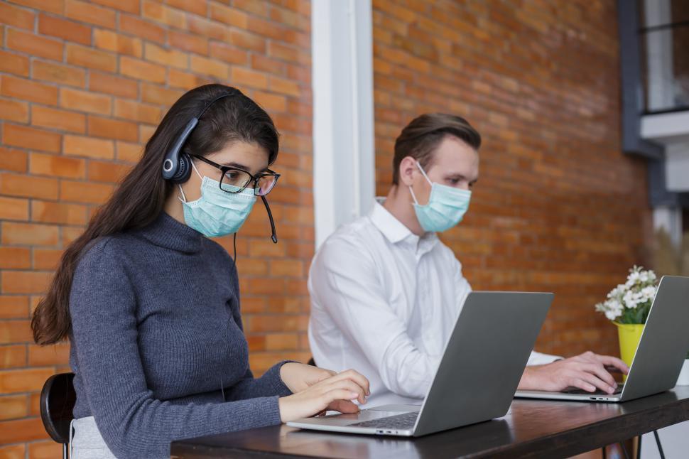 Free Image of Working in tech support group 