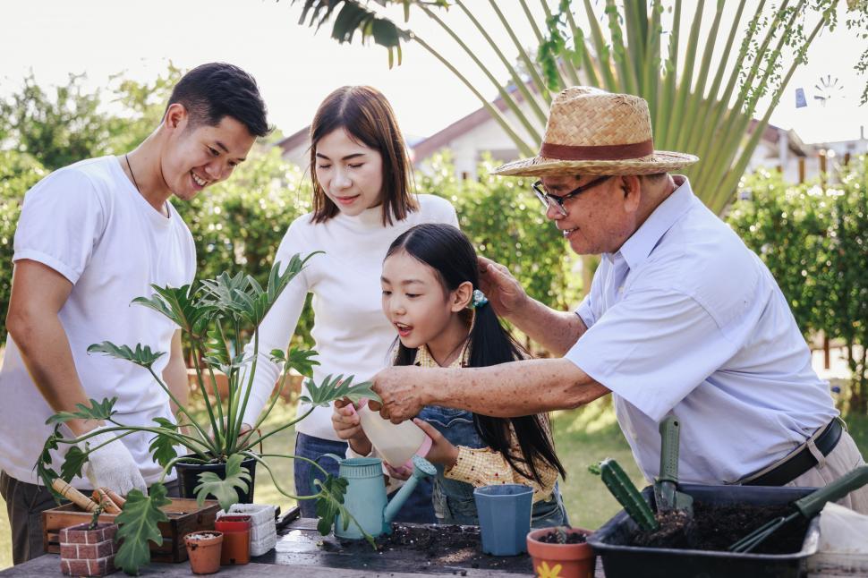 Free Image of Family help plant garden plants together 