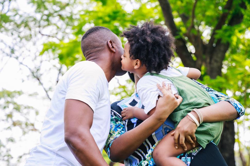Free Image of Happy family embrace outdoors 