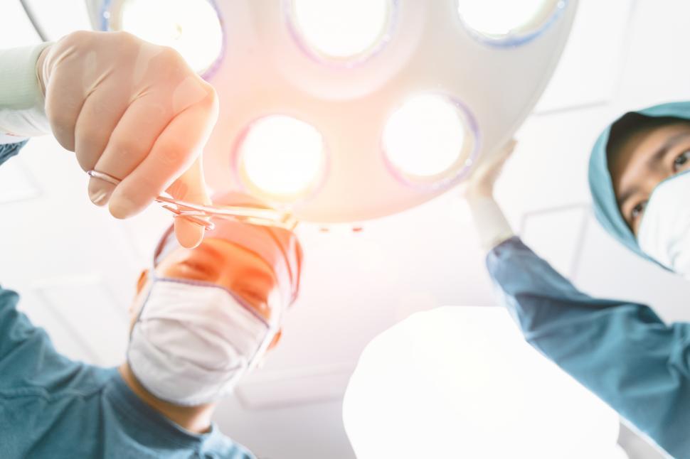 Free Image of Surgeon operating 