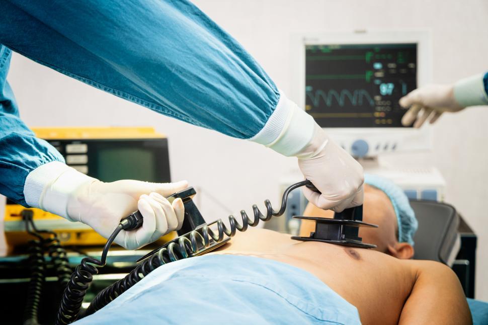 Free Image of Shock paddles during cardiac emergency 