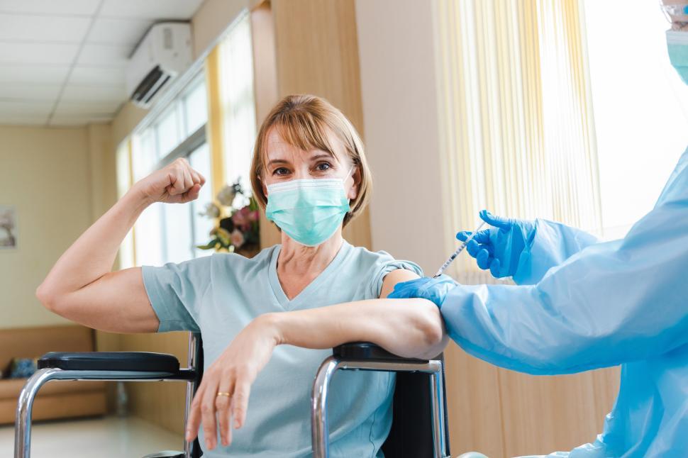Free Image of Woman made strong by vaccine 
