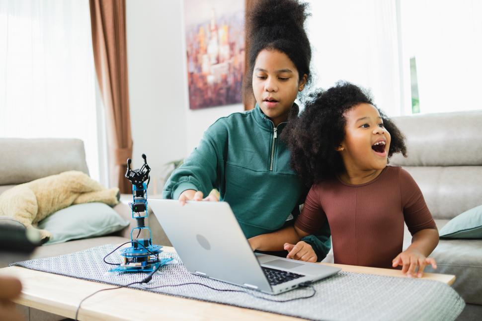 Free Image of Girls are excited about learning robotic technology 