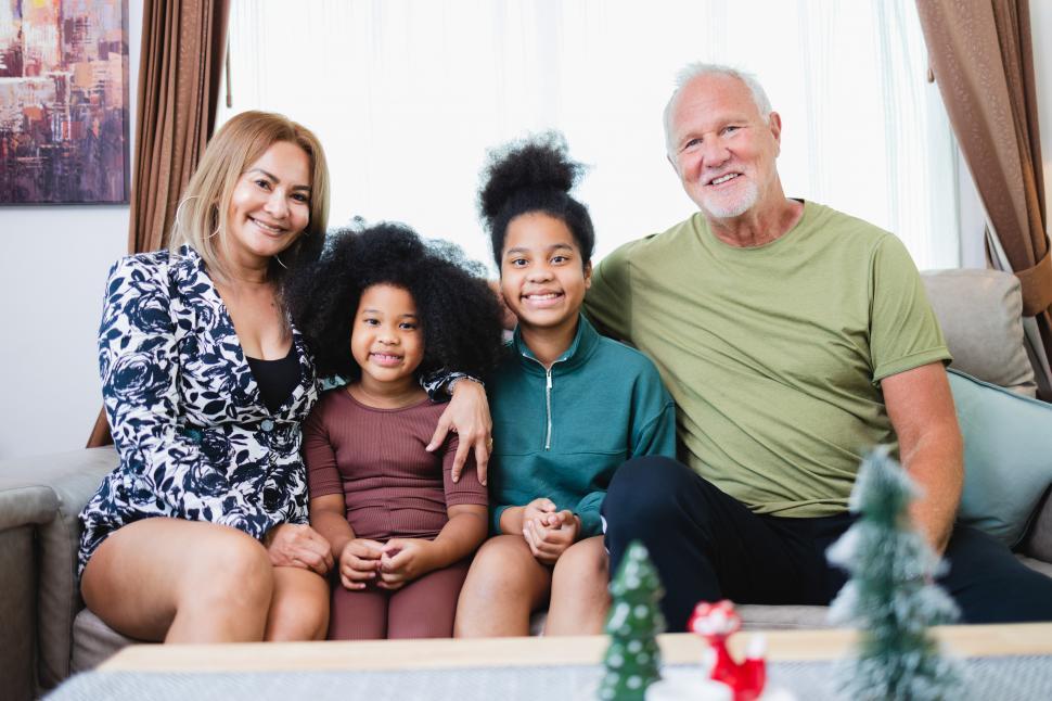 Free Image of Happy family on the sofa together 