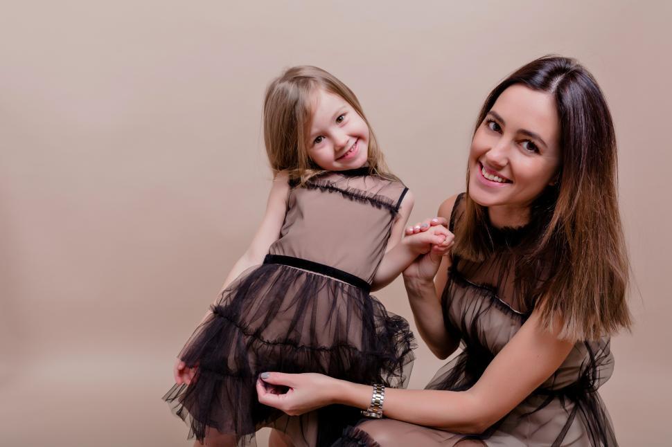 Free Image of Indoor portrait of mother with little cute child 