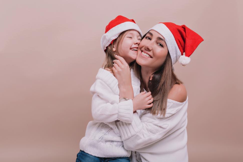 Free Image of Happy young mother with little funny girl laughing and hugging 