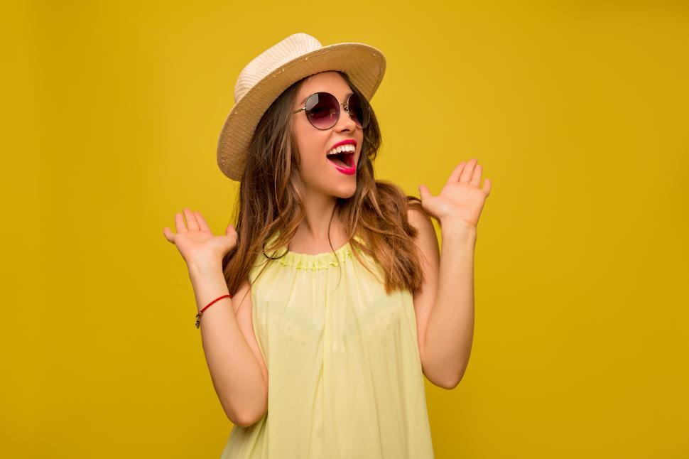 Free Image of Indoor portrait of excited girl with surprised expression 